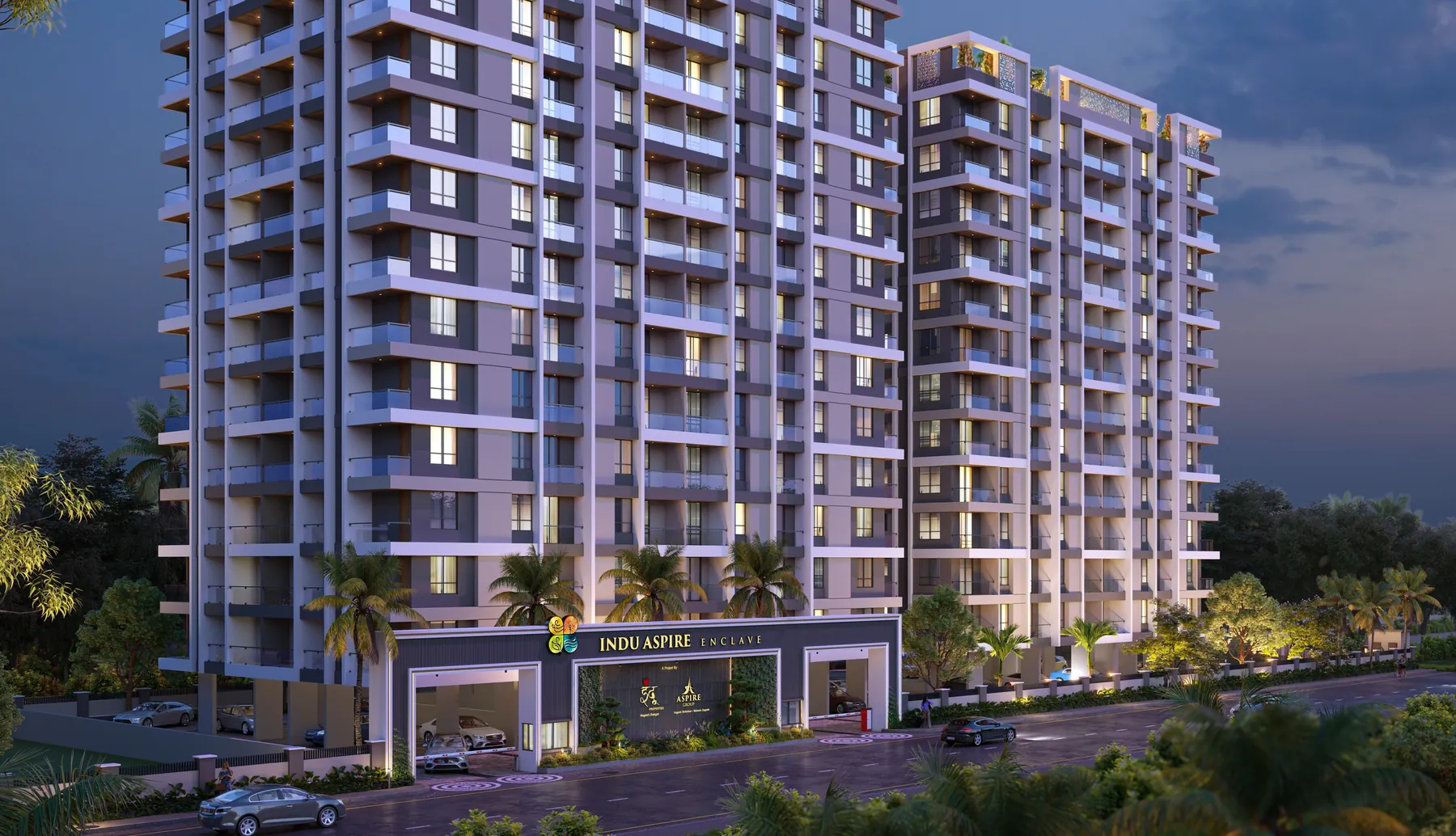 Indu Aspire Enclave towers at night